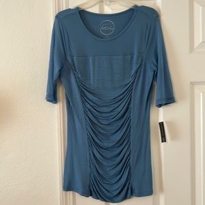 INC Ladies rich navy blue Pullover Top with sheer sleeves.